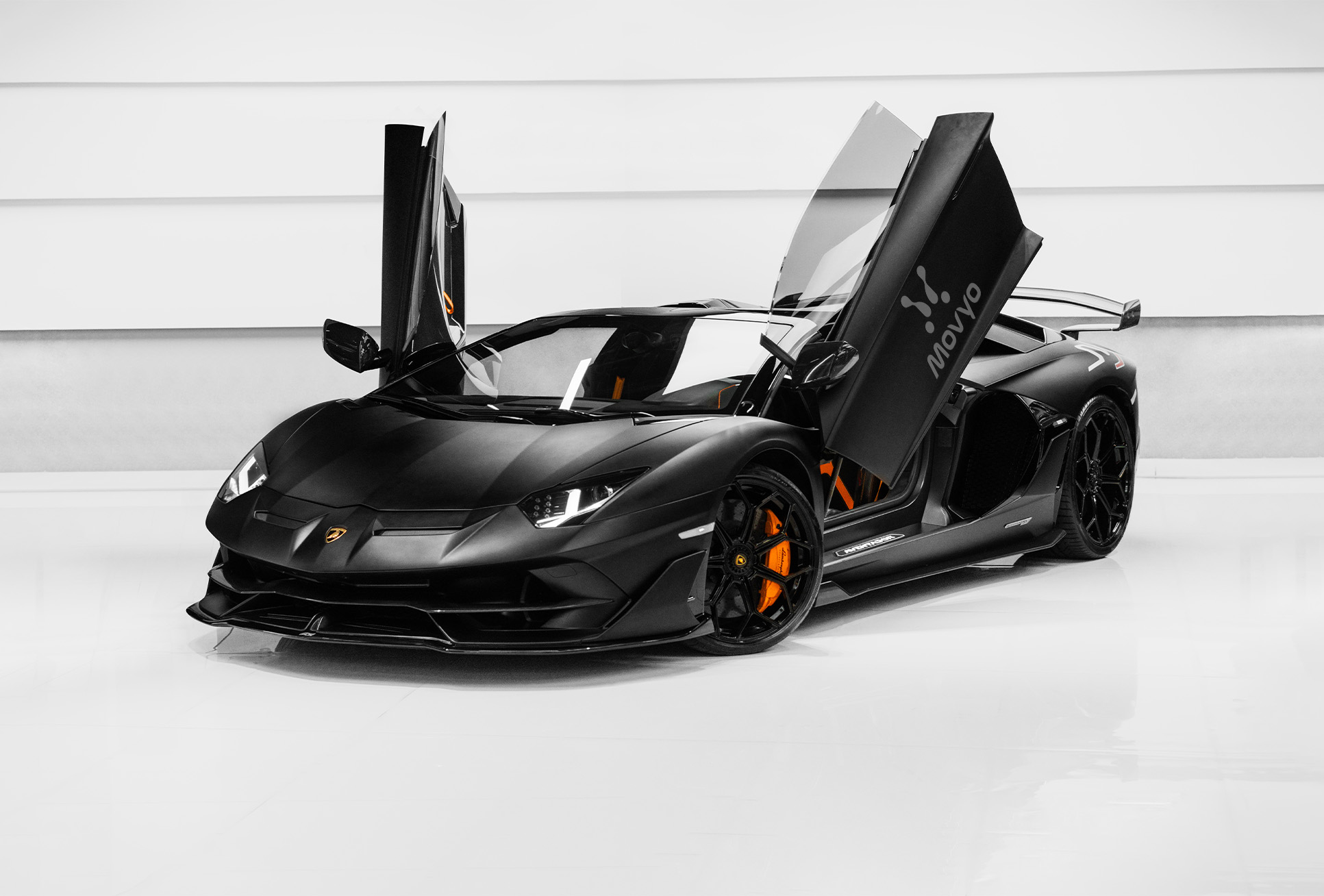 Movyocar Lamborghini Aventador Roadster Svj 1 car rental in dubai