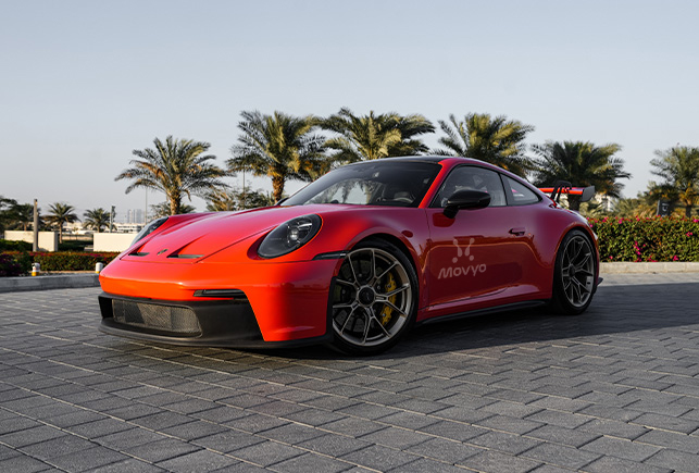 Movyocar Porsche Gt3 Orange car rental in dubai