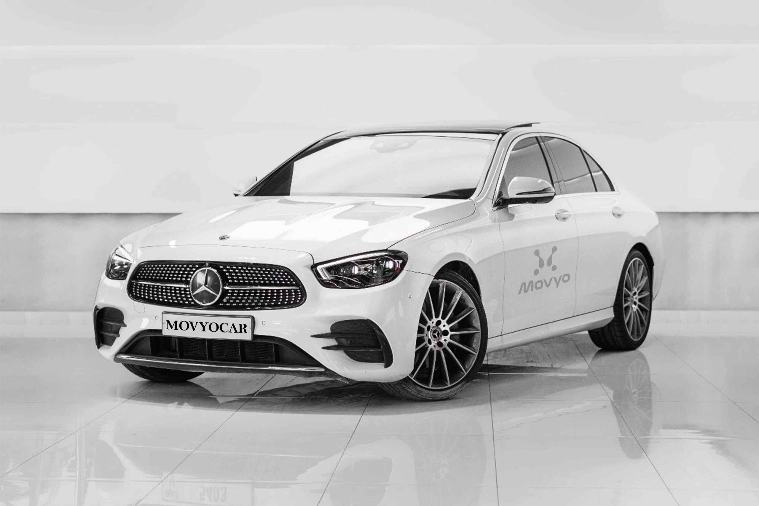 Movyocar Mercedes E 300 White car rental in dubai