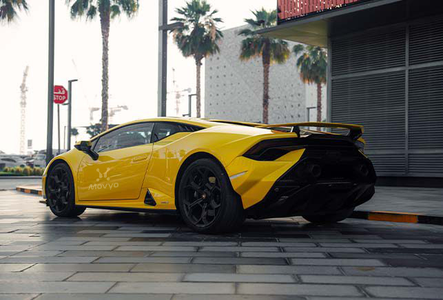 Movyocar Lamborghini Huracan Tecnica Yellow car rental in dubai