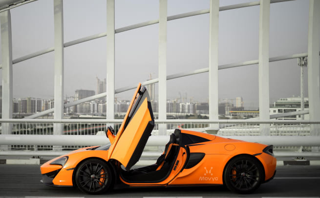 Movyocar Mclaren 570s Spider Orange car rental in dubai